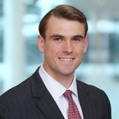 M. Logan Blake, Holtzman Vogel